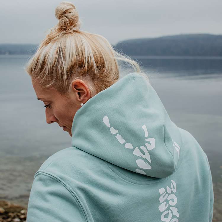 Unisex-Kapuzensweatshirt mit Leo Design auf dem Rücken